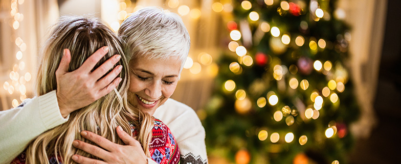 Family members embracing.